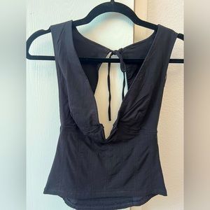 Free people XS black top, super cute, tags on, never worn